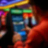 Intuitive User Interface of Foxwoods Sports Betting App User navigating through the Foxwoods Sports Betting App interface